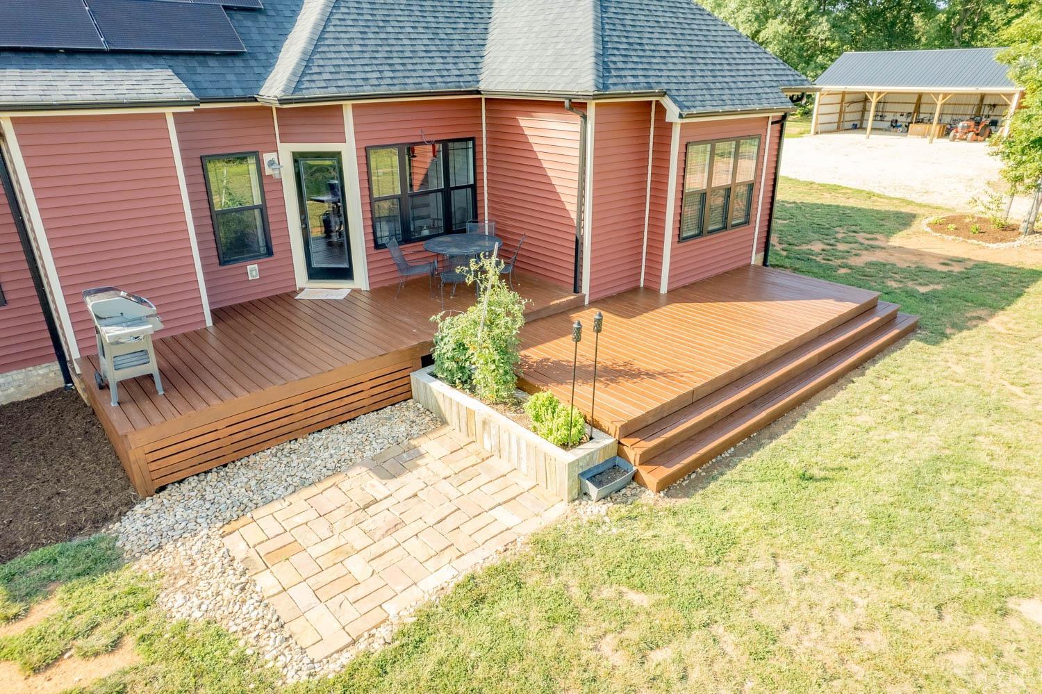 5972 Promise Land Road Appomattox, VA 24522 - Photo 68 of 84 a front view of a house with garden