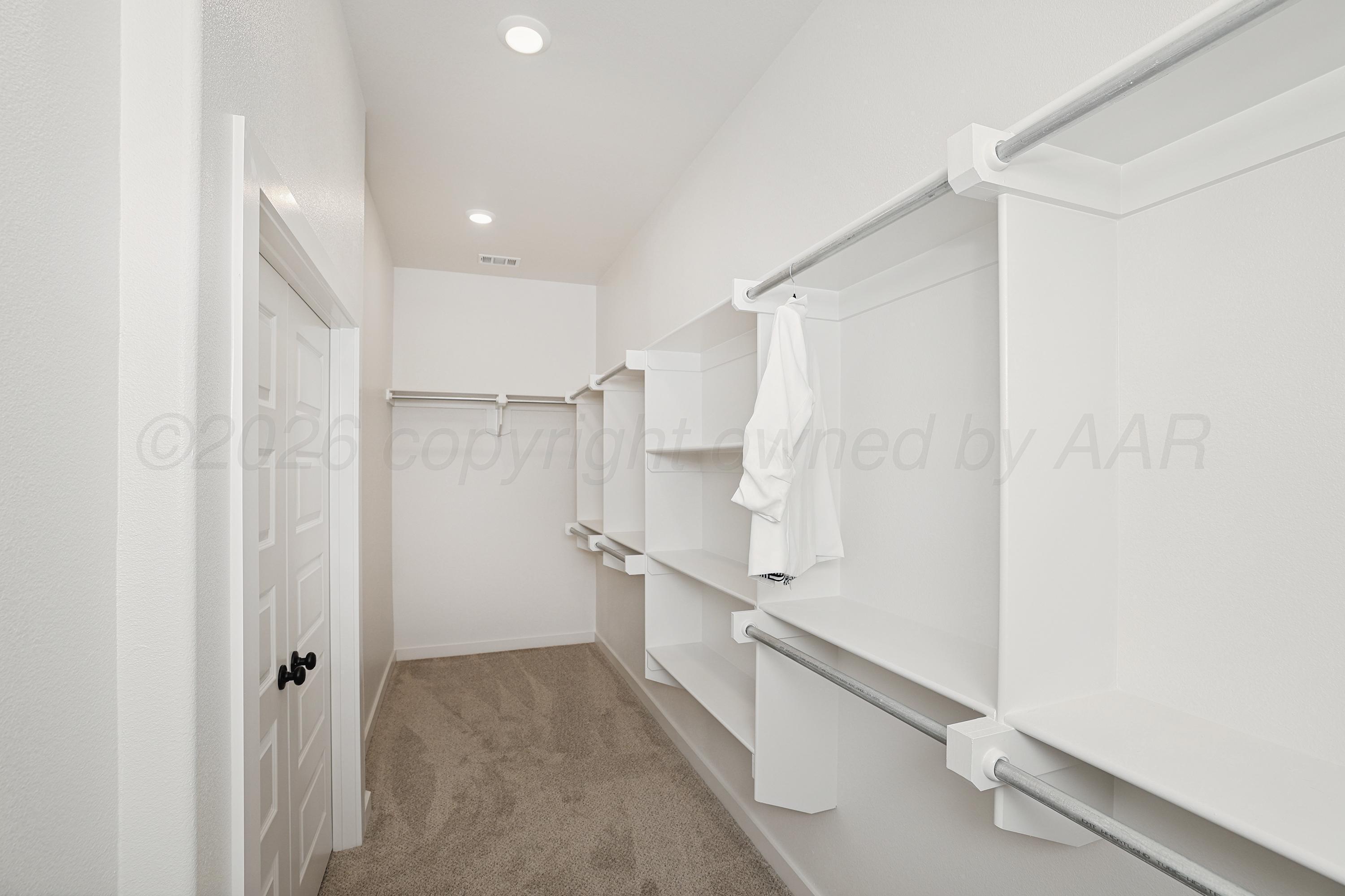 7506 Castleman Road Amarillo, TX 79119 - Photo 16 of 29 17-Primary Closet