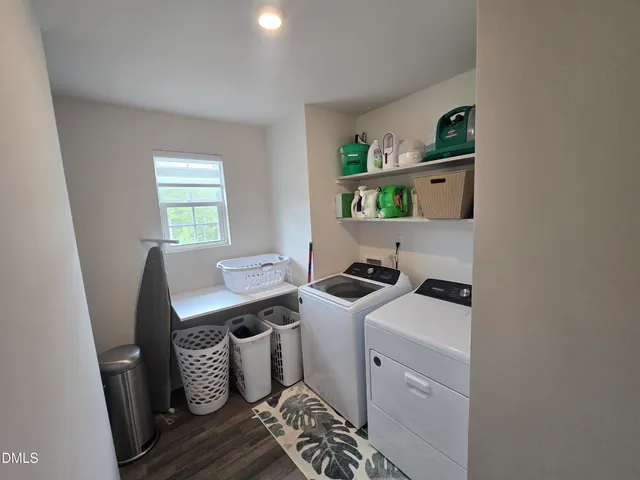 a room with furniture a stove and a window