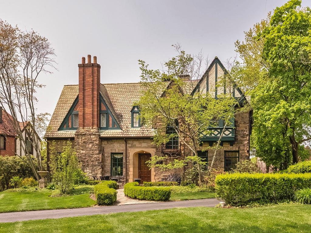 1174 Washington Road Pittsburgh, PA 15228 - Photo 1 of 47 a front view of a house with a garden