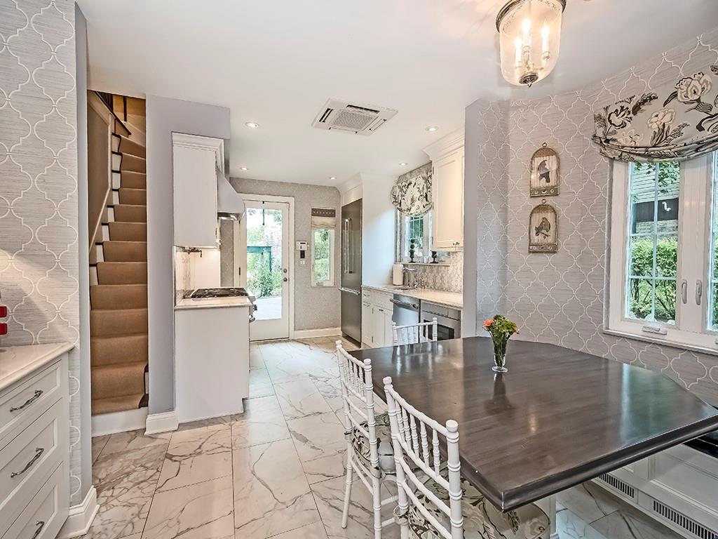 1174 Washington Road Pittsburgh, PA 15228 - Photo 13 of 47 a kitchen with stainless steel appliances granite countertop a sink a stove and a refrigerator