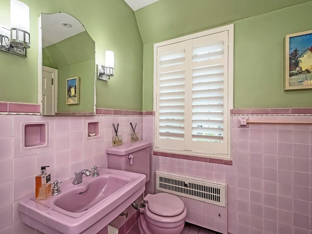 1174 Washington Road Pittsburgh, PA 15228 - Photo 27 of 47 a bathroom with a sink a toilet and mirror