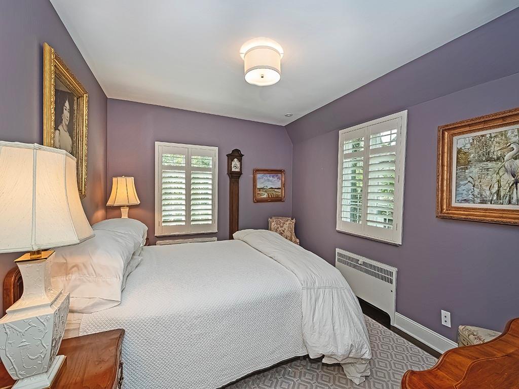 1174 Washington Road Pittsburgh, PA 15228 - Photo 28 of 47 a bedroom with a bed and a lamp next to a window