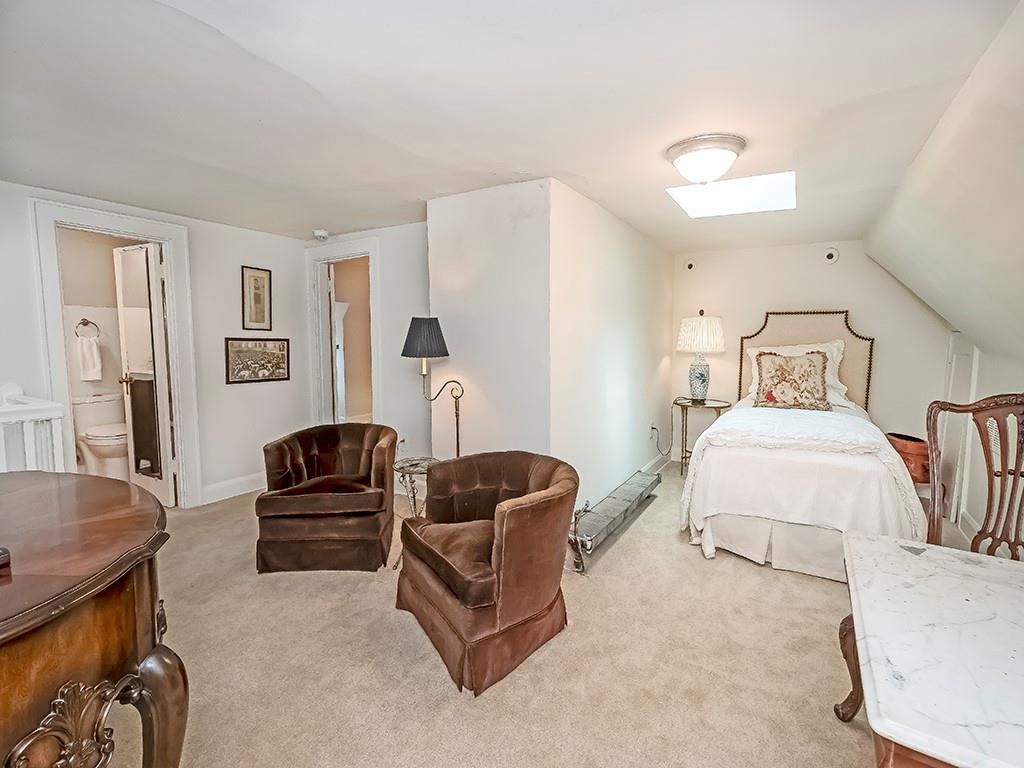 1174 Washington Road Pittsburgh, PA 15228 - Photo 29 of 47 a bedroom with furniture and a couch