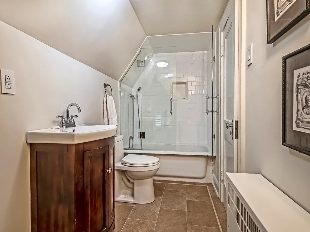 1174 Washington Road Pittsburgh, PA 15228 - Photo 32 of 47 a bathroom with a sink a toilet and shower