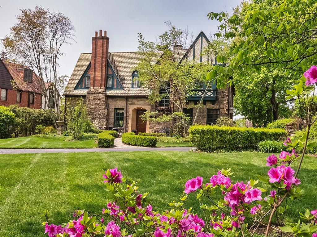 1174 Washington Road Pittsburgh, PA 15228 - Photo 40 of 47 a front view of a house with a big yard and potted plants