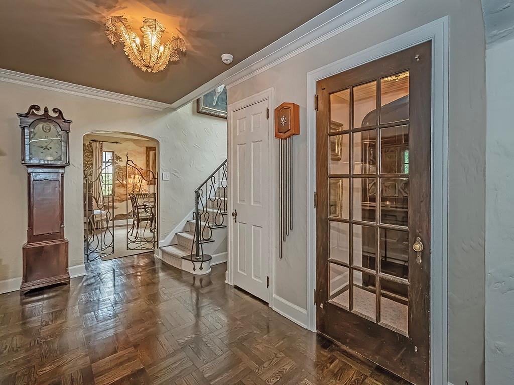 1174 Washington Road Pittsburgh, PA 15228 - Photo 4 of 47 a view of a livingroom with wooden floor and stairs