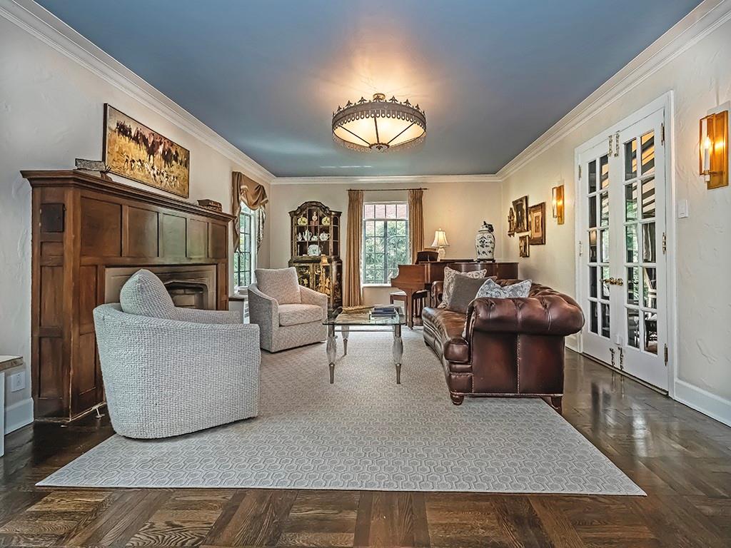 1174 Washington Road Pittsburgh, PA 15228 - Photo 6 of 47 a living room with furniture and a chandelier