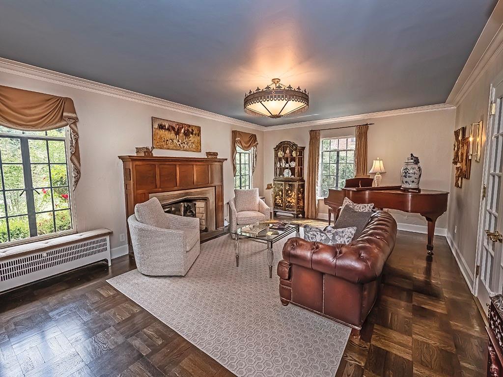 1174 Washington Road Pittsburgh, PA 15228 - Photo 7 of 47 a living room with furniture a fireplace and a window