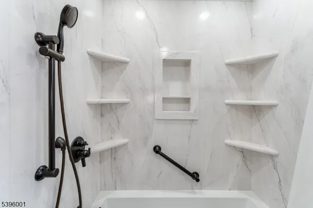 an aerial view of residential house and outdoor space