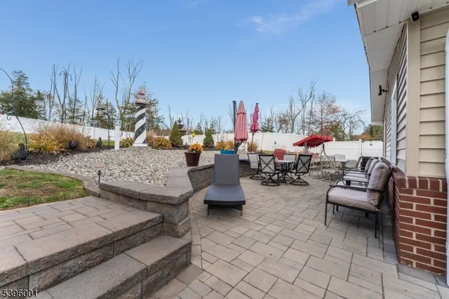 a view of kitchen living room with furniture and flat screen tv