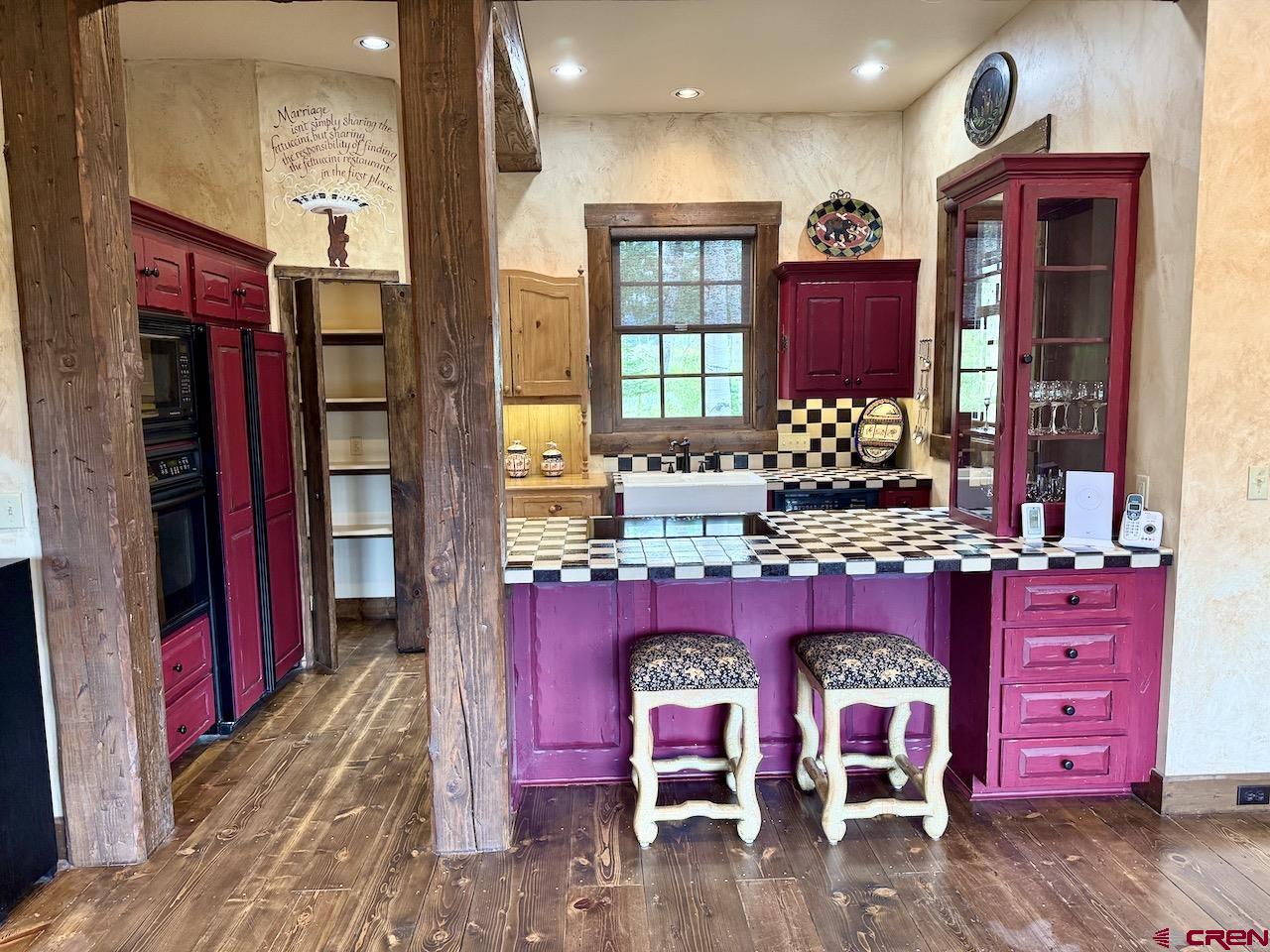88 Castle Rock Court Crested Butte, CO 81224 - Photo 14 of 44 a dining room with furniture
