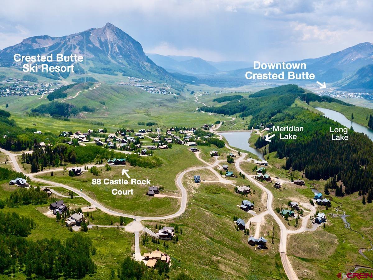 88 Castle Rock Court Crested Butte, CO 81224 - Photo 2 of 44 a view of a swimming pool with a yard