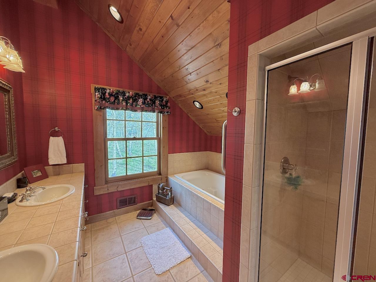 88 Castle Rock Court Crested Butte, CO 81224 - Photo 24 of 44 a bathroom with a bathtub sink and toilet