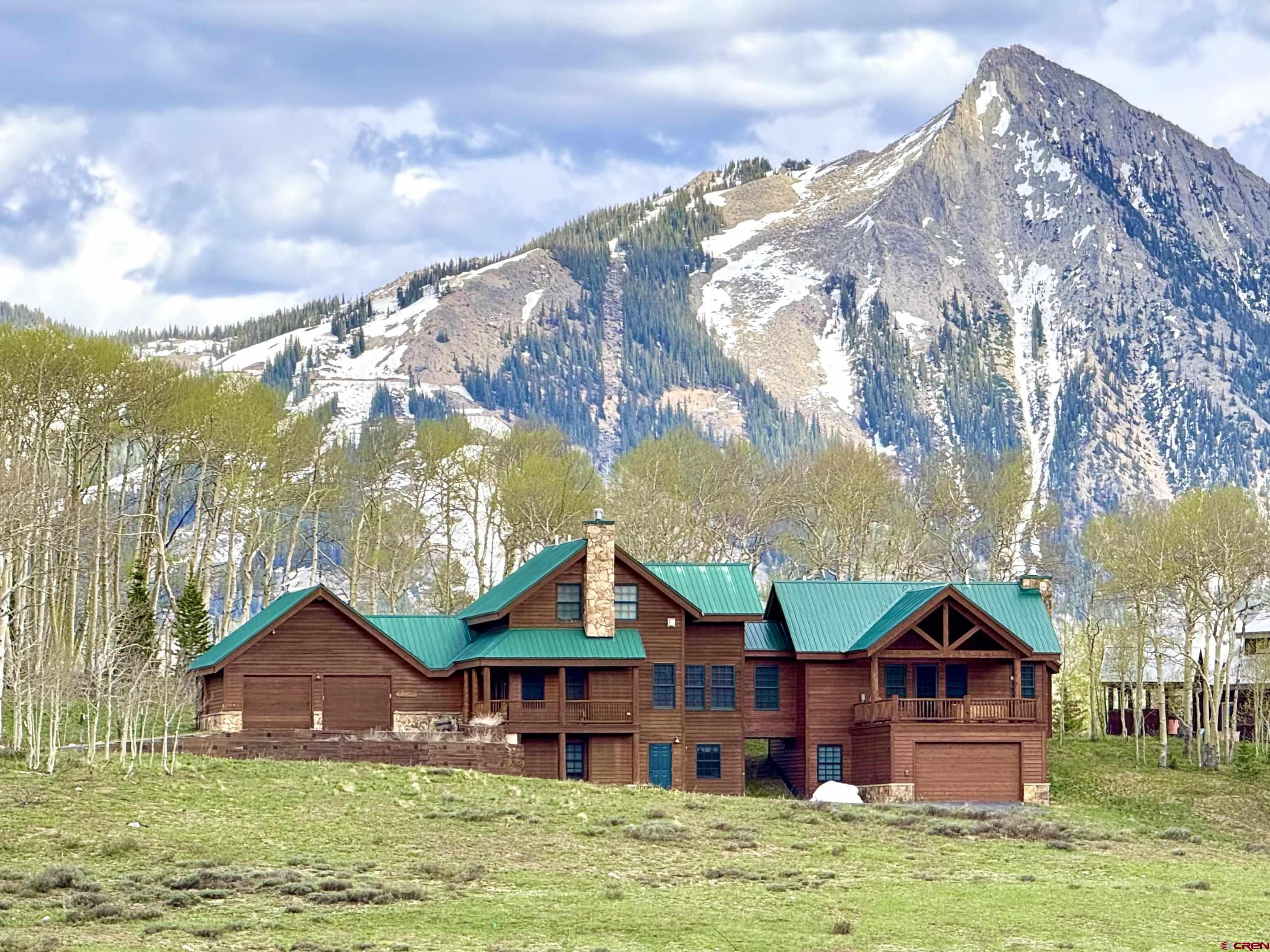 88 Castle Rock Court Crested Butte, CO 81224 - Photo 42 of 44 a front view of a house with garden