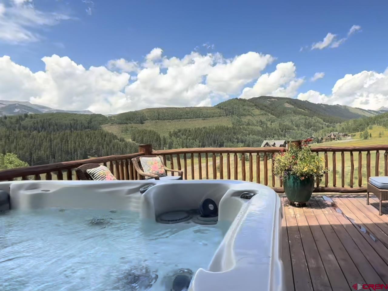88 Castle Rock Court Crested Butte, CO 81224 - Photo 5 of 44 a view of balcony with furniture and lake view