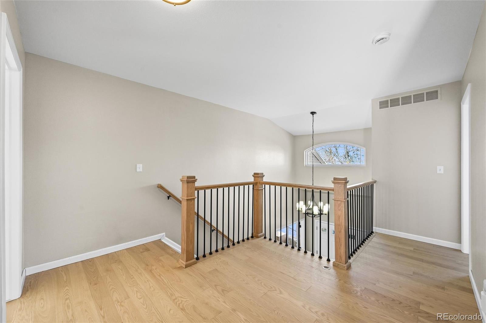 10096 Hughes Place Highlands Ranch, CO 80126 - Photo 18 of 50 a view of a hallway with closet area