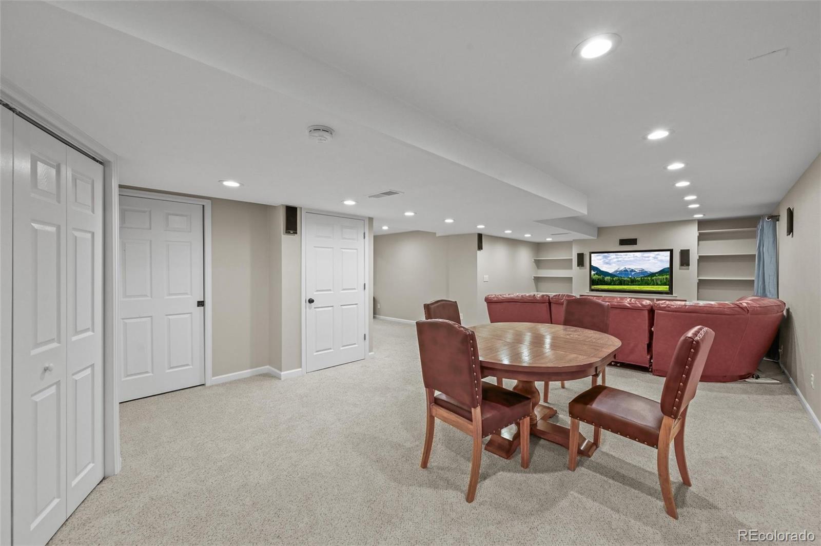 10096 Hughes Place Highlands Ranch, CO 80126 - Photo 32 of 50 a view of a dining room with furniture