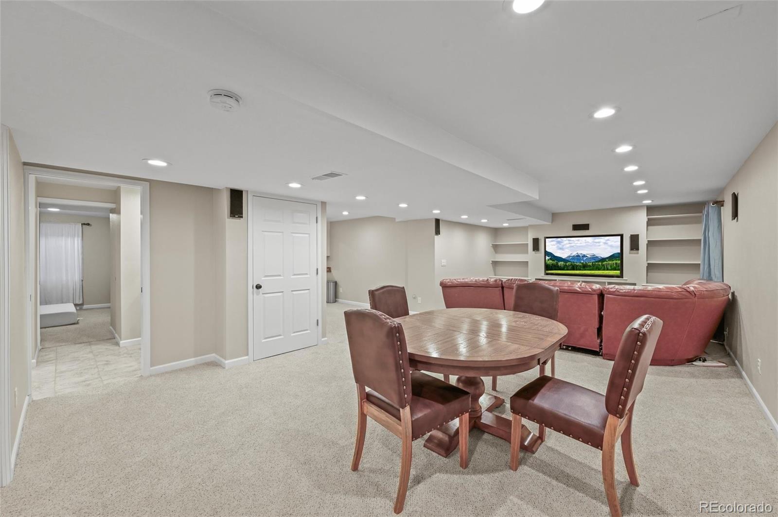 10096 Hughes Place Highlands Ranch, CO 80126 - Photo 34 of 50 a dining room with furniture and window