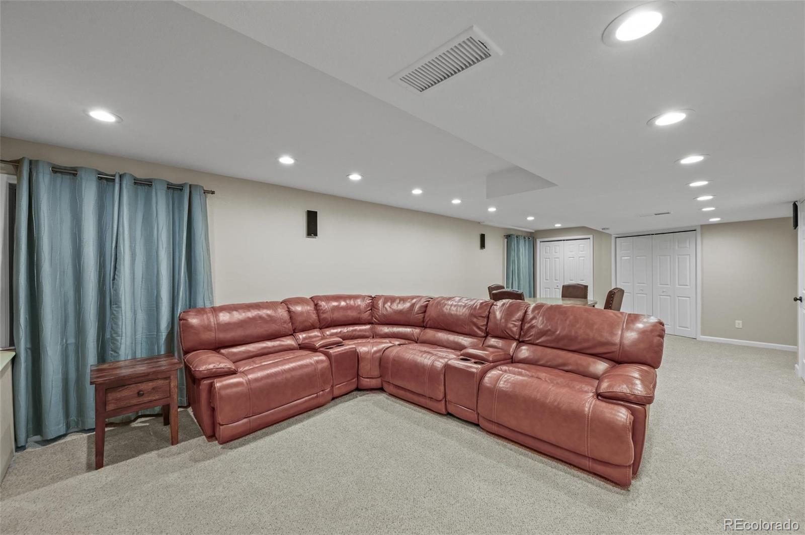 10096 Hughes Place Highlands Ranch, CO 80126 - Photo 35 of 50 a living room with furniture