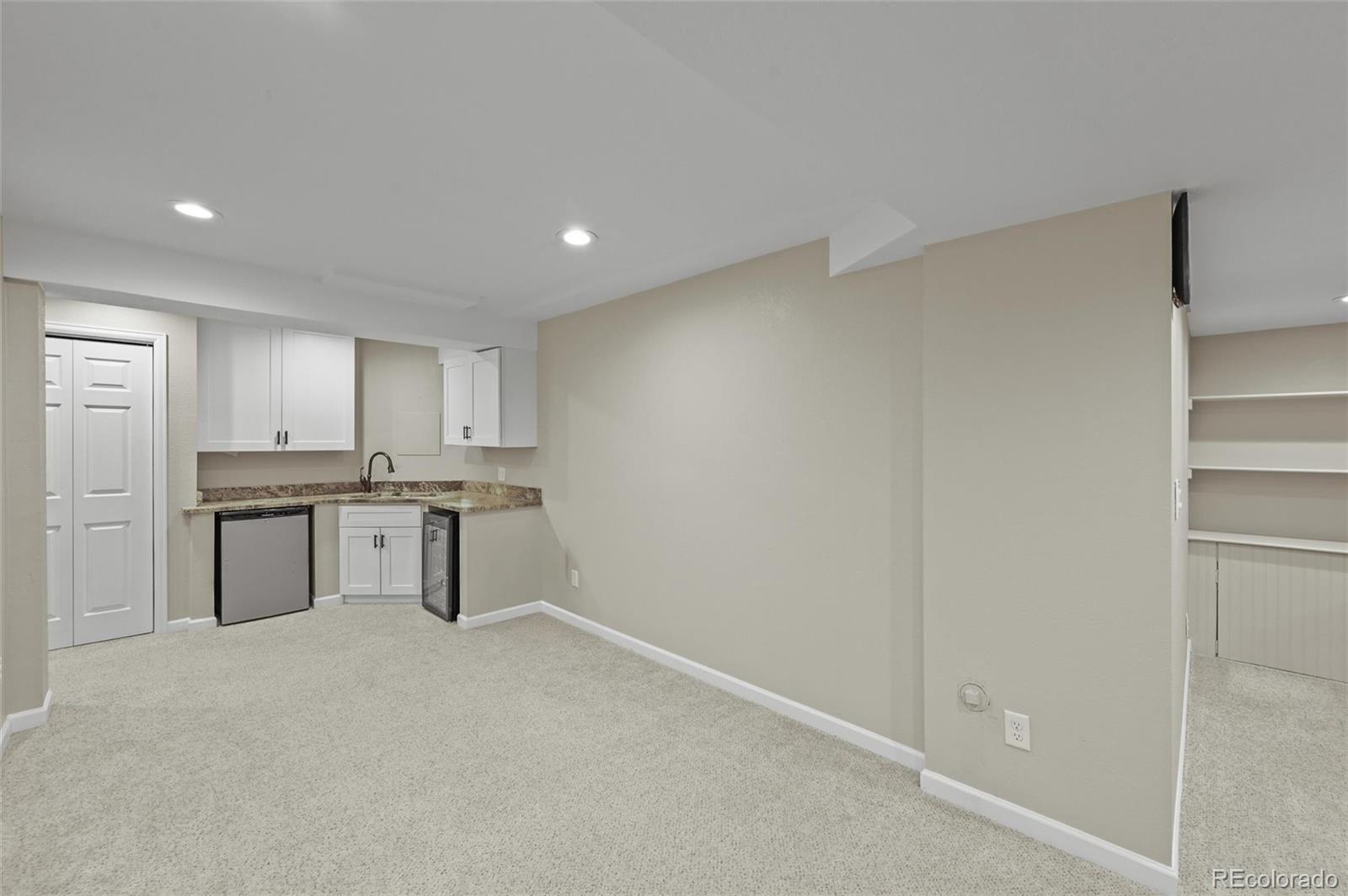 10096 Hughes Place Highlands Ranch, CO 80126 - Photo 37 of 50 a view of cabinets and window