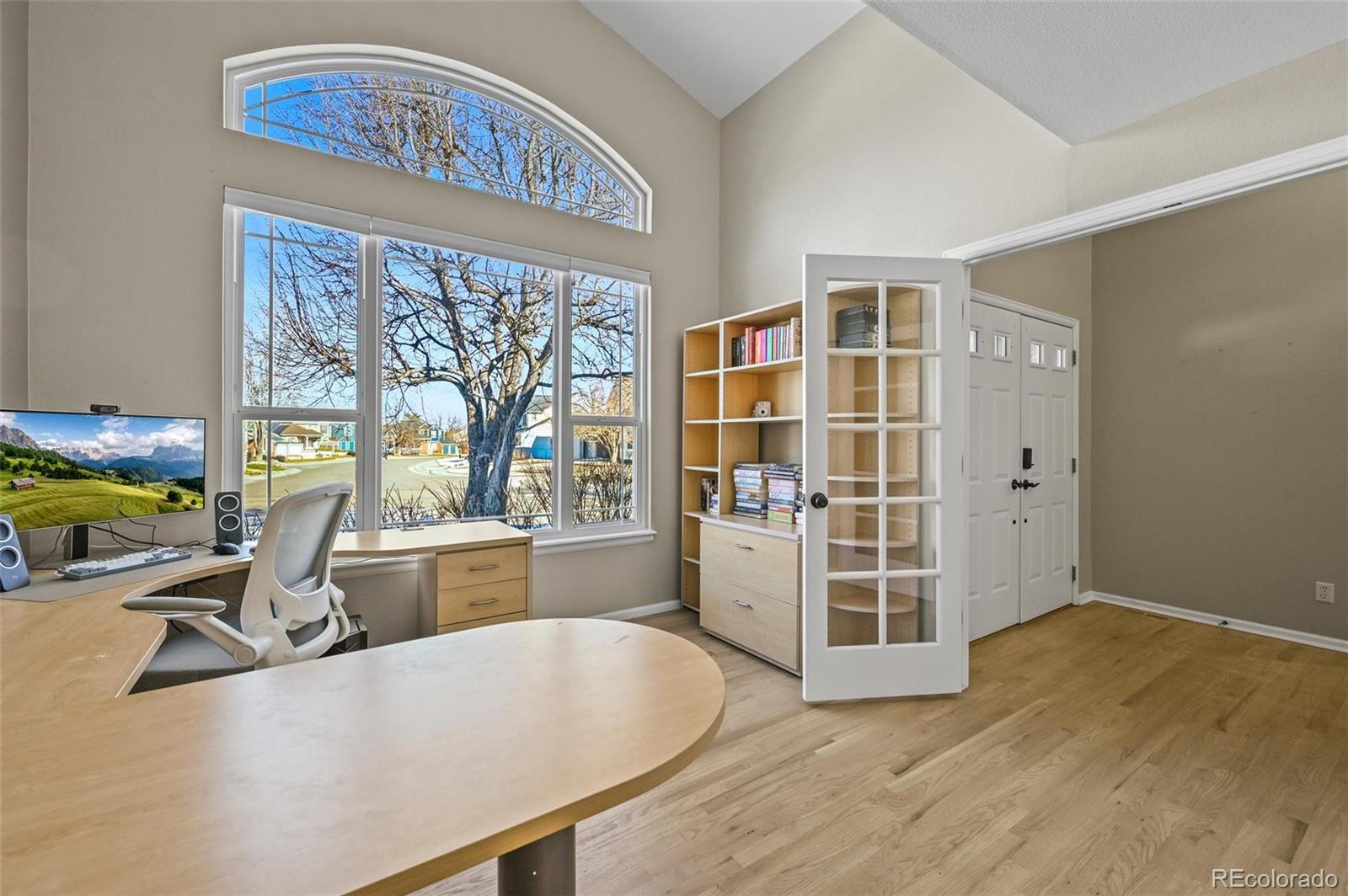10096 Hughes Place Highlands Ranch, CO 80126 - Photo 4 of 50 a view of a livingroom with furniture window and outside view