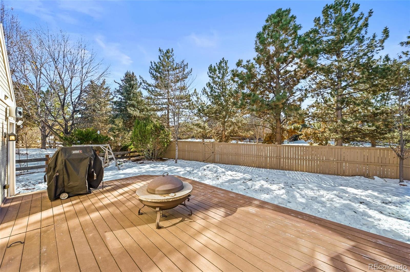 10096 Hughes Place Highlands Ranch, CO 80126 - Photo 42 of 50 a view of outdoor space with garden