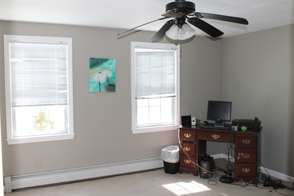 124 Mashapaug Road Sturbridge, MA 01566 - Photo 12 of 30 a view of a workspace with furniture and a window