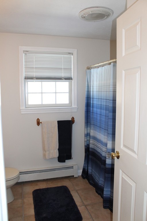 124 Mashapaug Road Sturbridge, MA 01566 - Photo 18 of 30 a view of room with a window and wardrobe