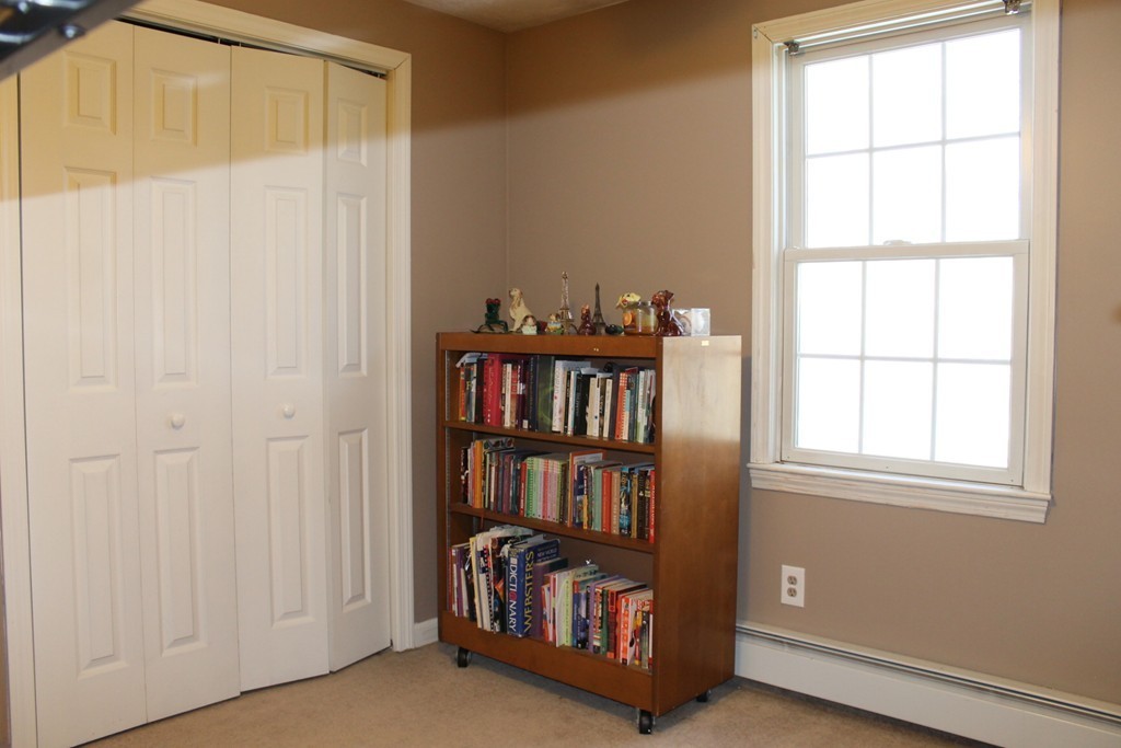 124 Mashapaug Road Sturbridge, MA 01566 - Photo 21 of 30 a view of an empty room with a window