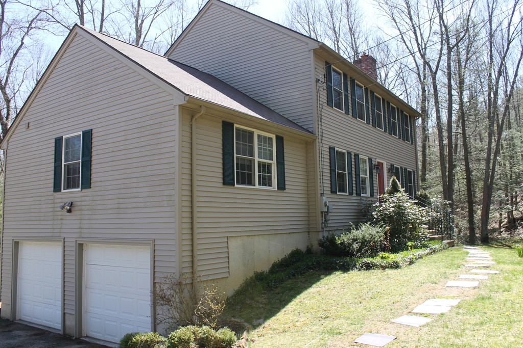 124 Mashapaug Road Sturbridge, MA 01566 - Photo 29 of 30 a view of a house with snow on the house