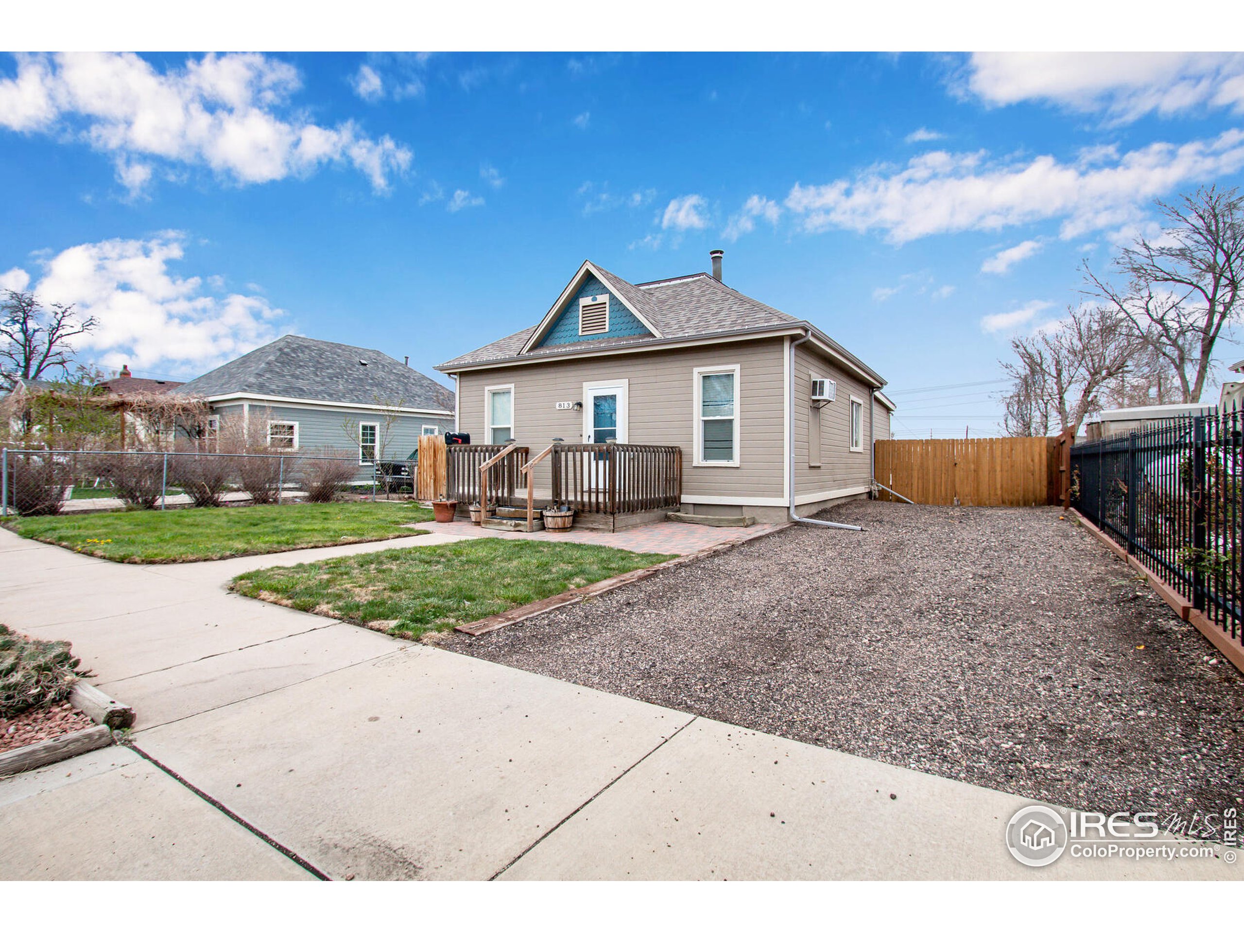 a view of house with a yard