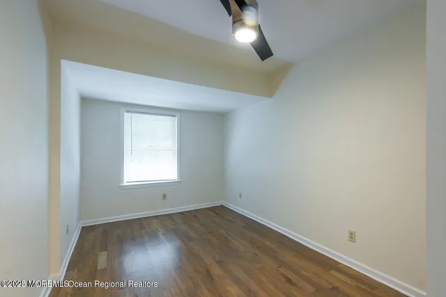 a view of a bathroom with a glass door