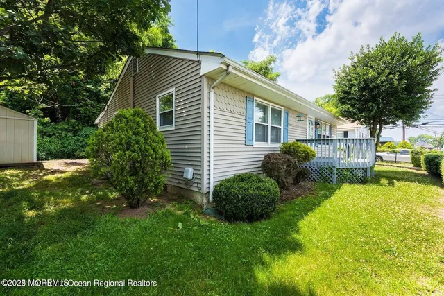 a view of balcony with wooden floor