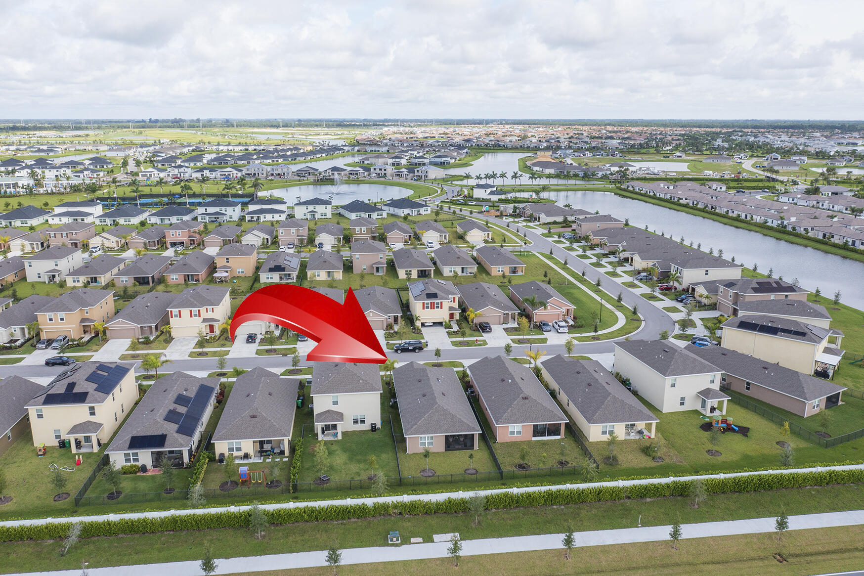 12236 Rimini Way Port St. Lucie, FL 34987 - Photo 3 of 43 DJI_0791_arrow