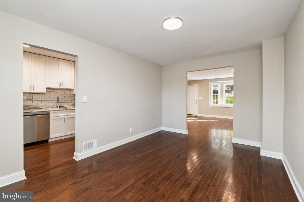 124 Brandon Road Baltimore, MD 21212 - Photo 5 of 25 Formal dining room engineered wood floors