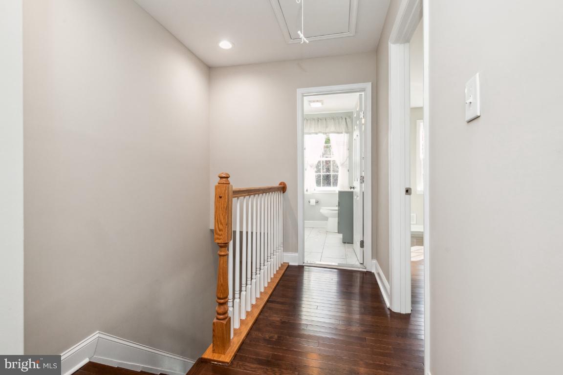 124 Brandon Road Baltimore, MD 21212 - Photo 10 of 25 Upstairs hall way with pull down attic stairs