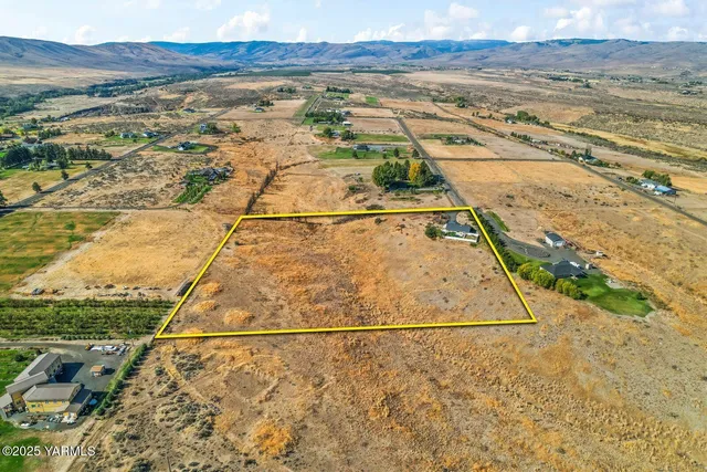 a view of an ocean and mountain