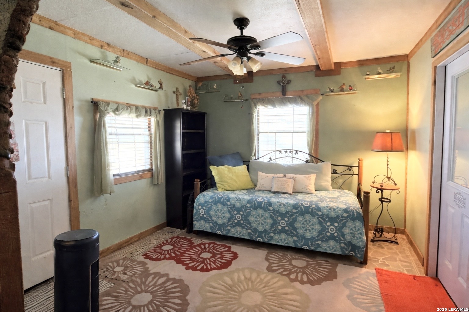116 Debra Lane Hunt, TX 78024 - Photo 16 of 34 a bedroom with a bed mirror and window