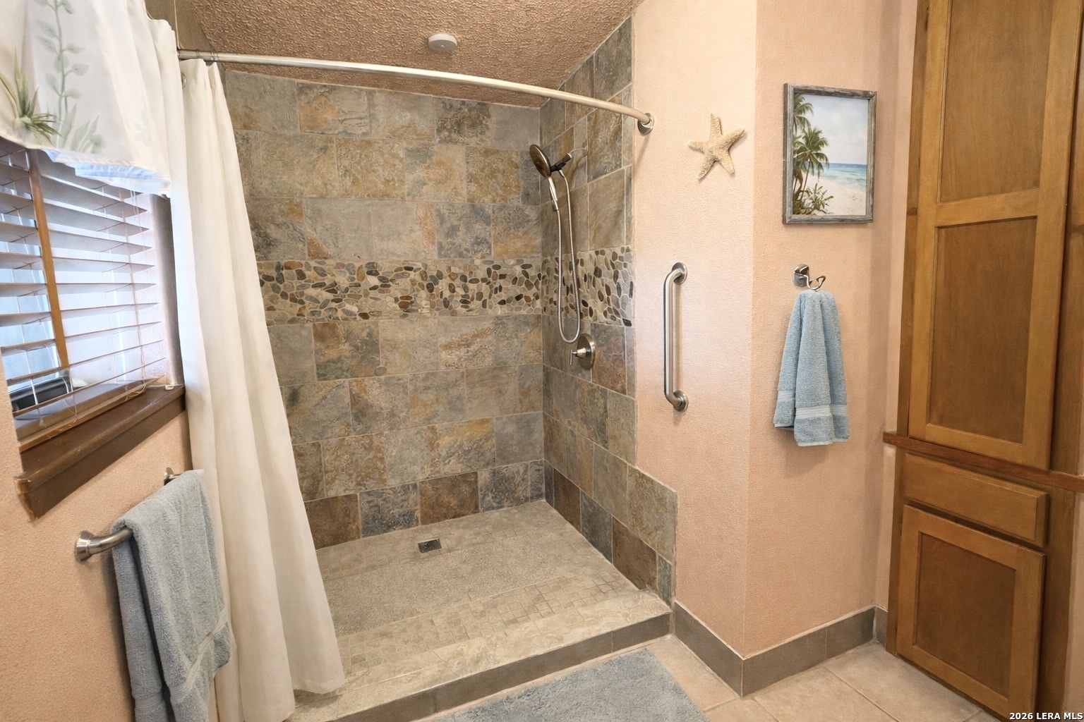 116 Debra Lane Hunt, TX 78024 - Photo 18 of 34 a bathroom with a shower