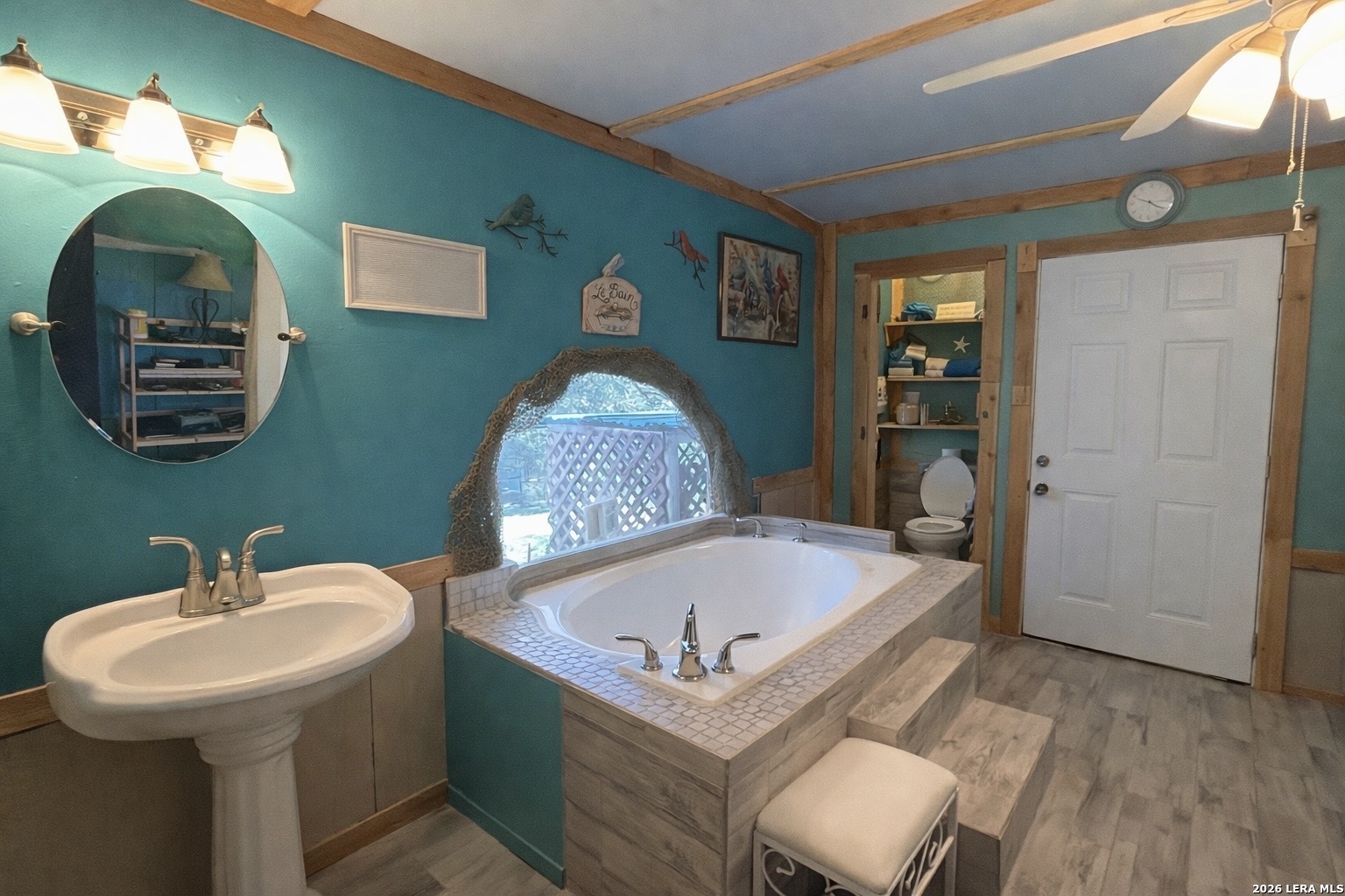 116 Debra Lane Hunt, TX 78024 - Photo 19 of 34 a bathroom with a sink and a mirror