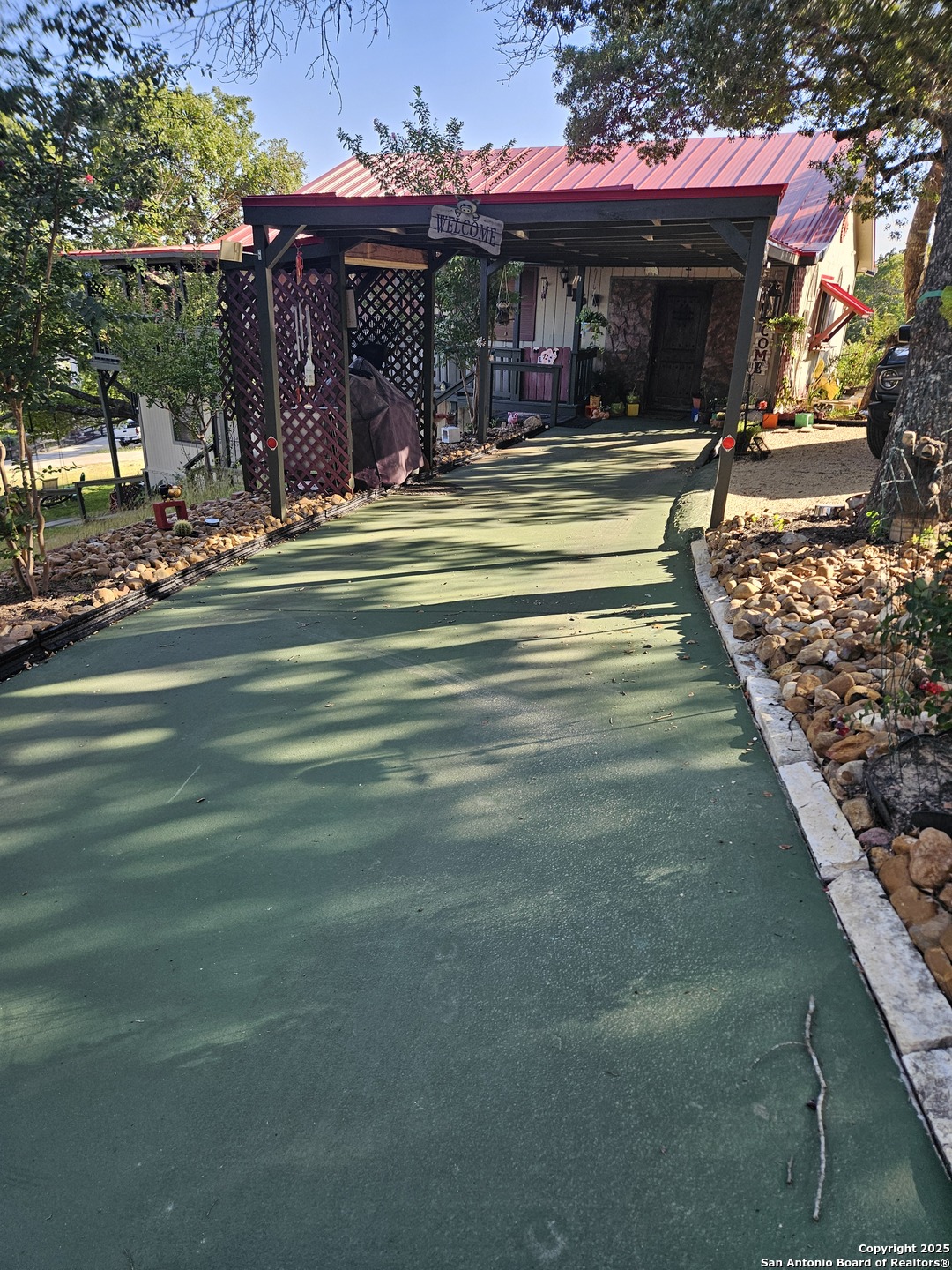 116 Debra Lane Hunt, TX 78024 - Photo 20 of 34 a view of a water fountain in front of retail shops