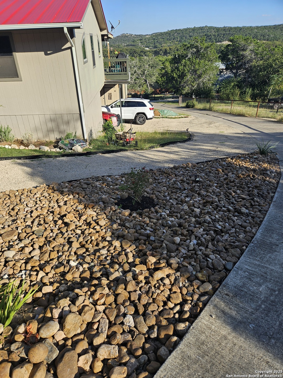 116 Debra Lane Hunt, TX 78024 - Photo 24 of 34 a view of a yard with wooden fence