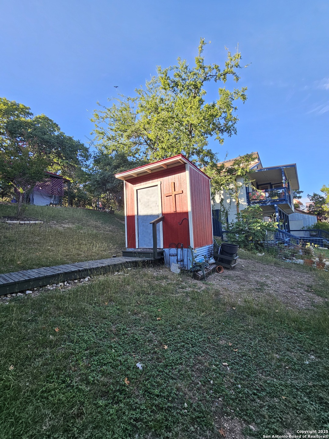 116 Debra Lane Hunt, TX 78024 - Photo 32 of 34 a view of a house with a backyard