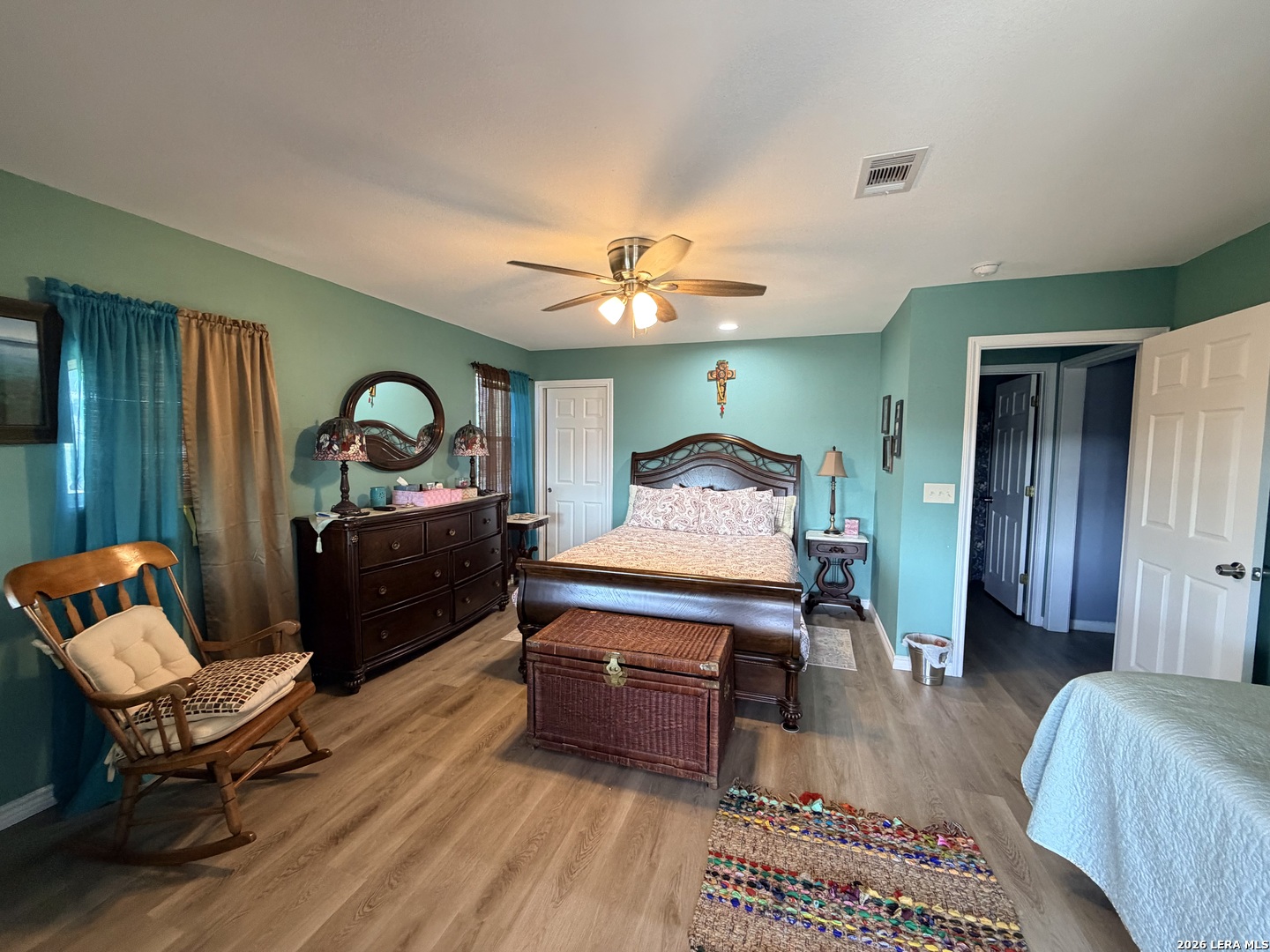 116 Debra Lane Hunt, TX 78024 - Photo 8 of 34 a living room with furniture and a wooden floor