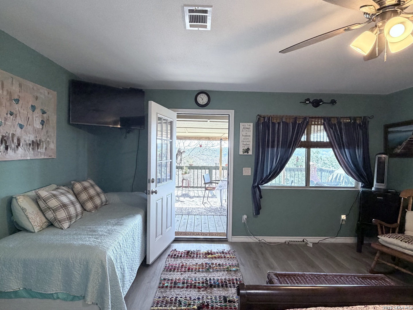 116 Debra Lane Hunt, TX 78024 - Photo 9 of 34 a living room with a bed furniture and a window