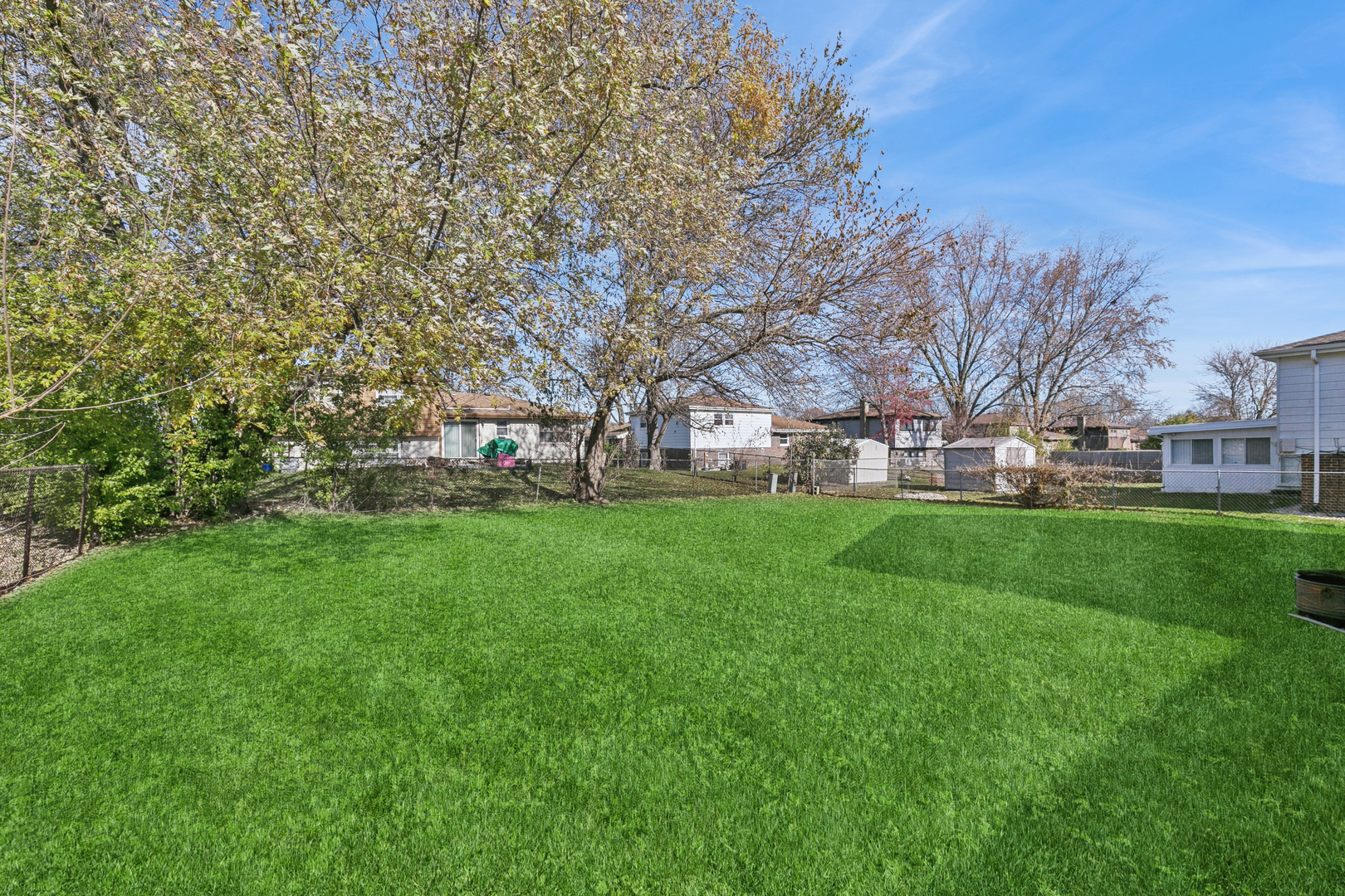 6306 Beaver Dam Road Matteson, IL 60443 - Photo 19 of 20 a view of a house with a big yard