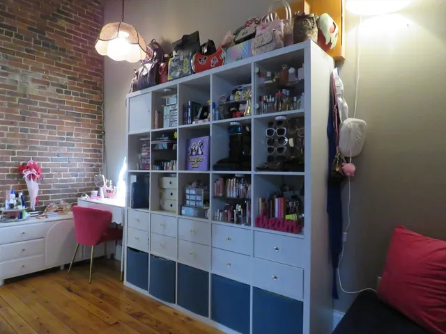 a view of a workspace with furniture