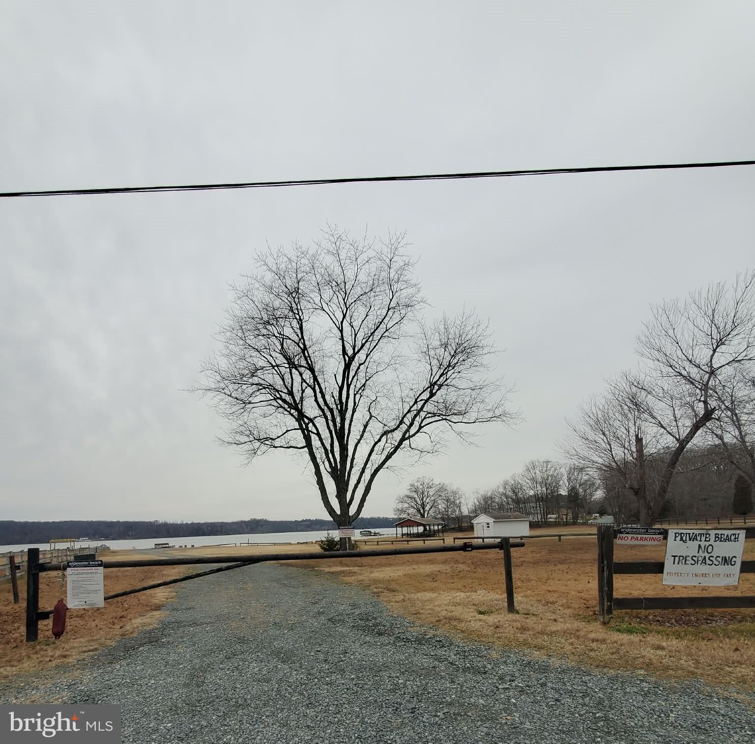 17 Robin Road Stafford, VA 22554 - Photo 16 of 17 Tranquil path to a serene lakeside view.