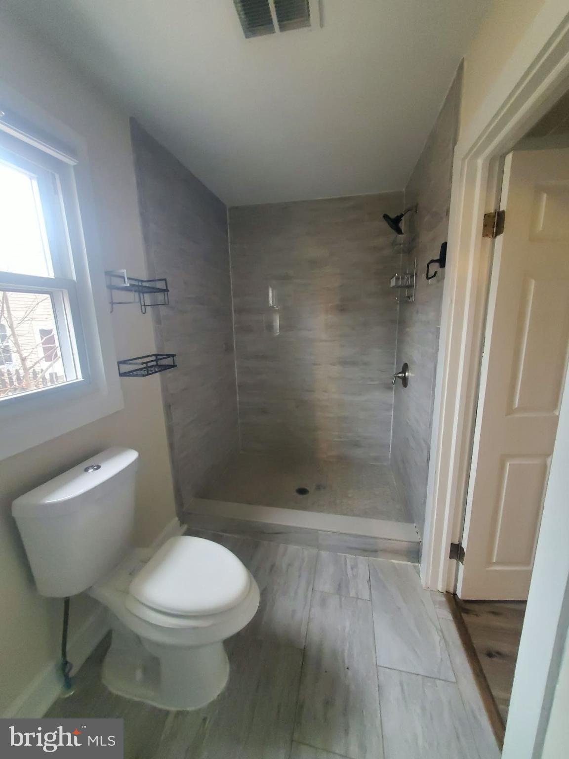 17 Robin Road Stafford, VA 22554 - Photo 5 of 17 Modern bathroom with sleek tile design.